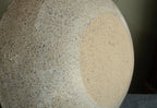 White platter/ bowl with black stones