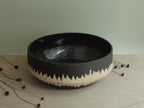 Black bowl with white stripe