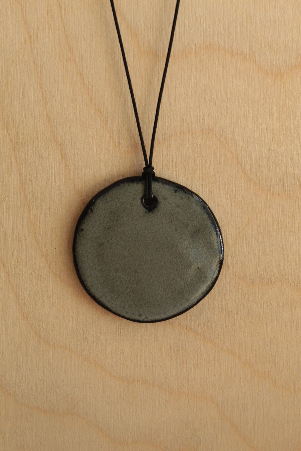 Dark sage green circle necklace