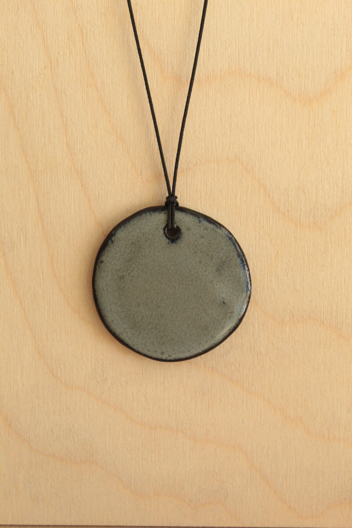 Dark sage green circle necklace