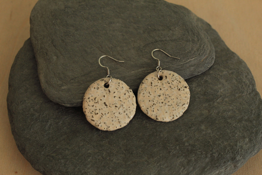 White circle with rocks dangling earrings