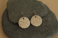 White circle with rocks dangling earrings
