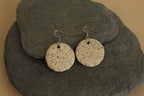 White circle with rocks dangling earrings