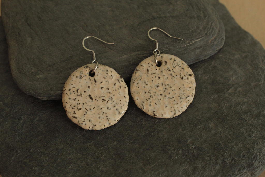 White circle with rocks dangling earrings