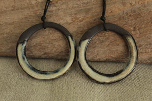 Black and beige hoop dangling earrings with cord