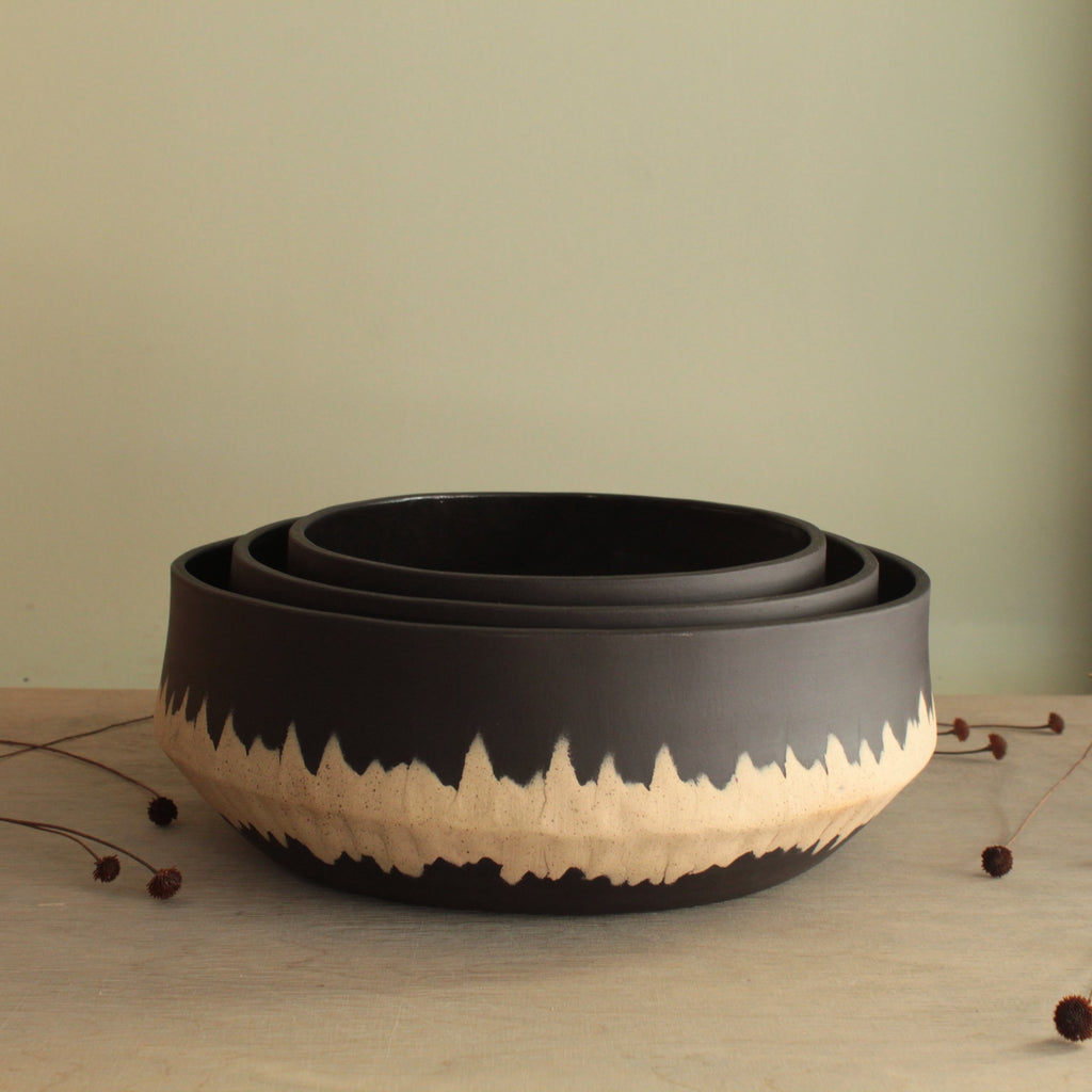 Black bowl with white stripe