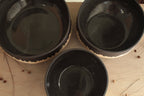 Black bowl with white stripe