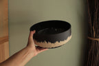 Black bowl with white stripe