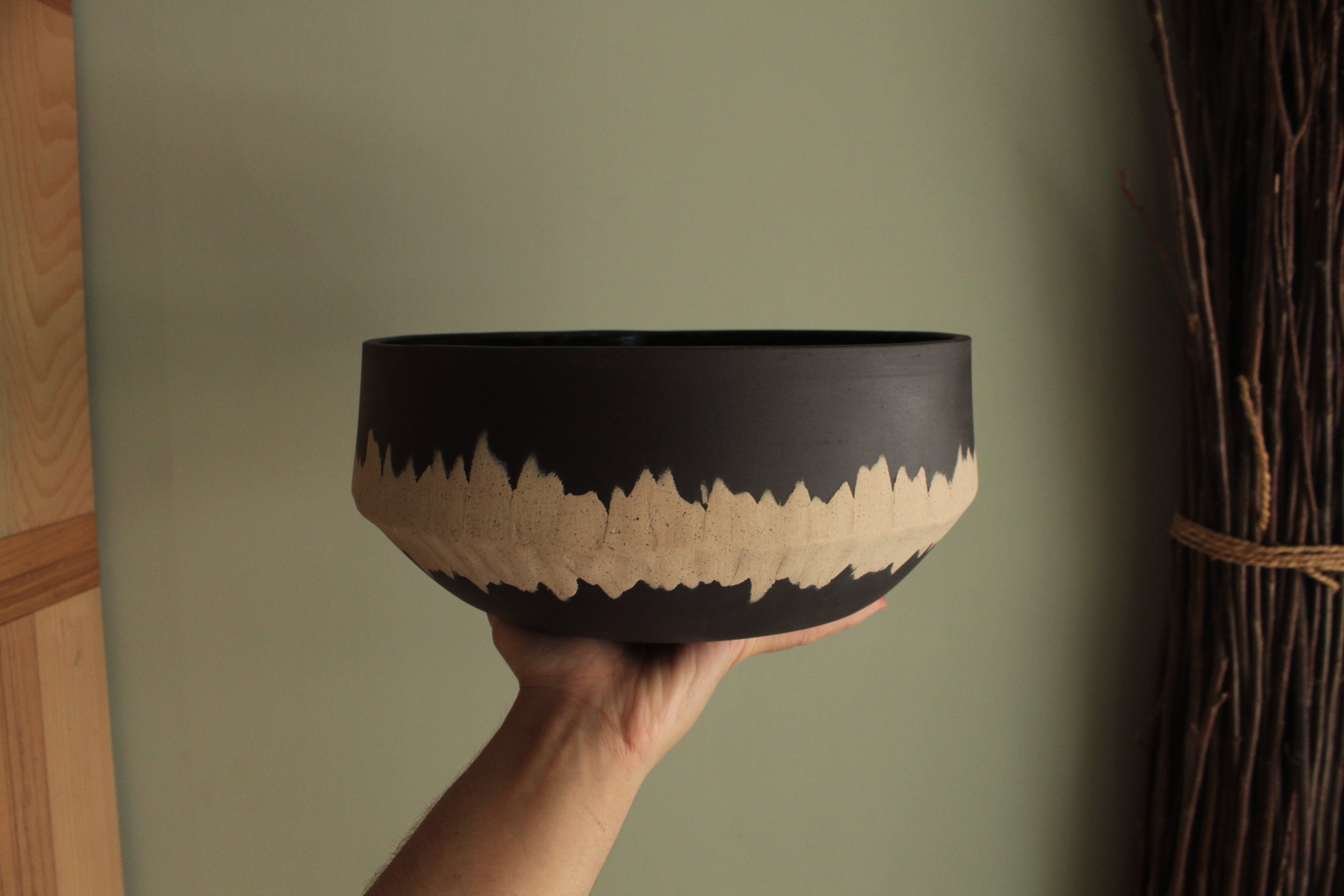 Black bowl with white stripe