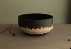 Black bowl with white stripe