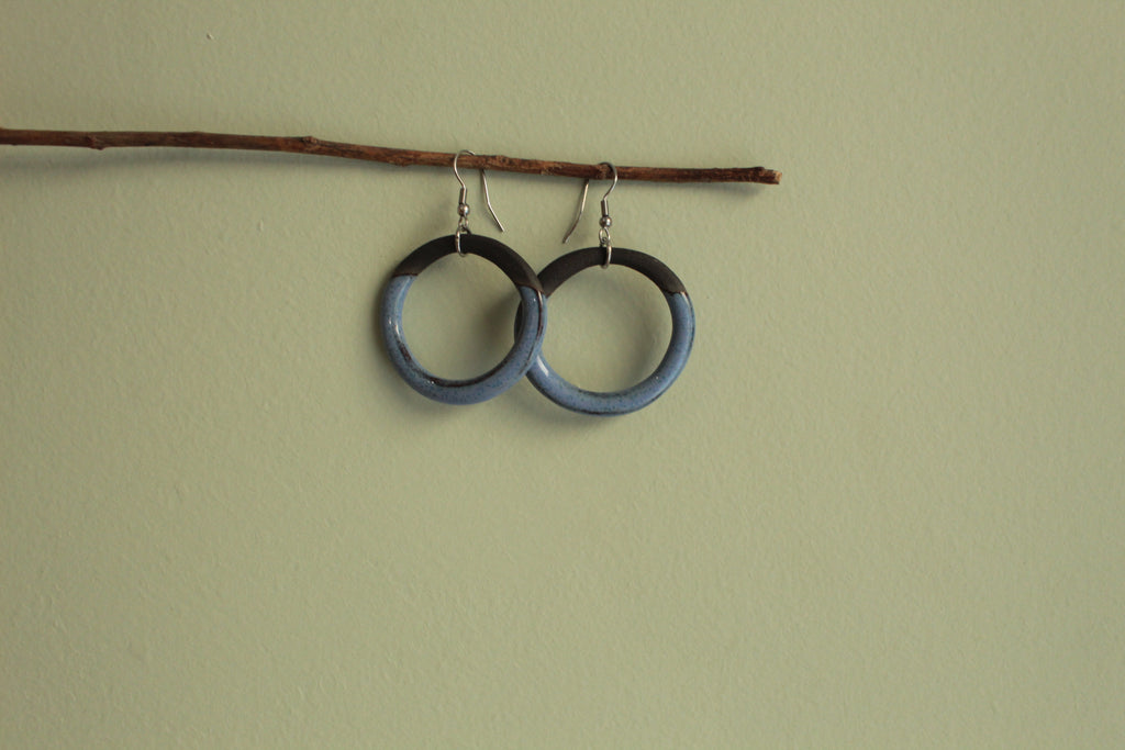 Black and blue hoop dangling earrings