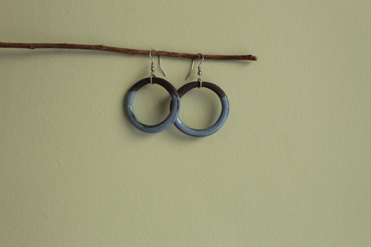 Black and blue hoop dangling earrings