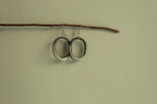 Maira oval hoop dangling earrings
