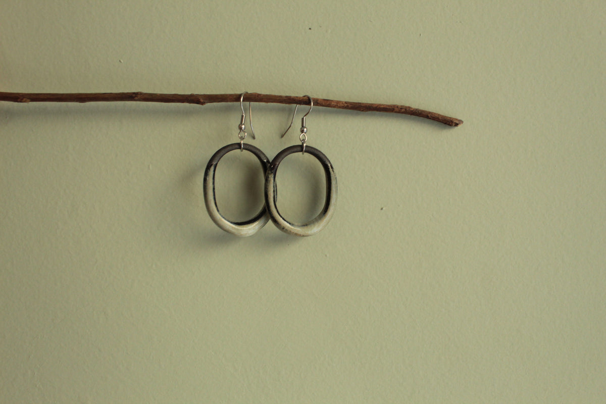 Maira oval hoop dangling earrings