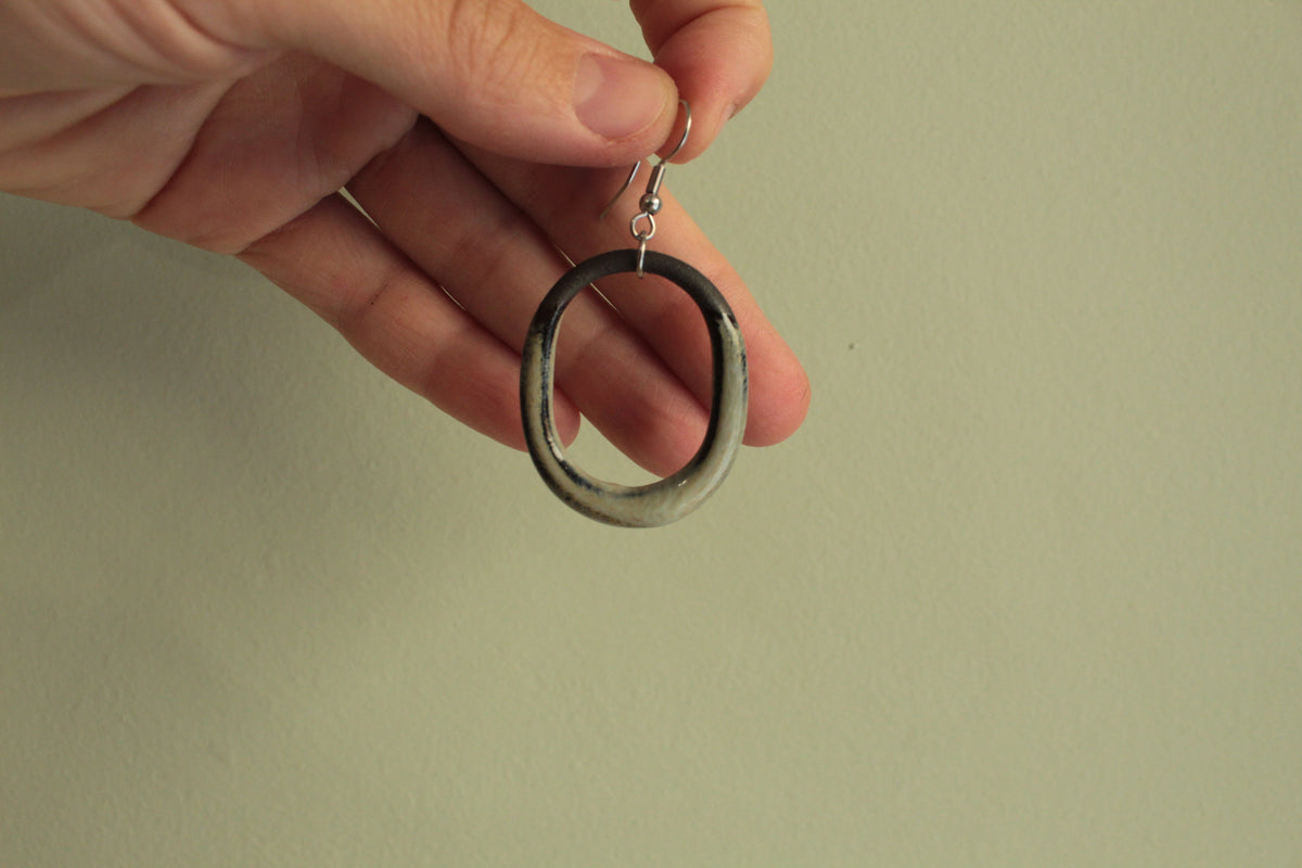 Maira oval hoop dangling earrings