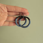 Black and blue hoop dangling earrings