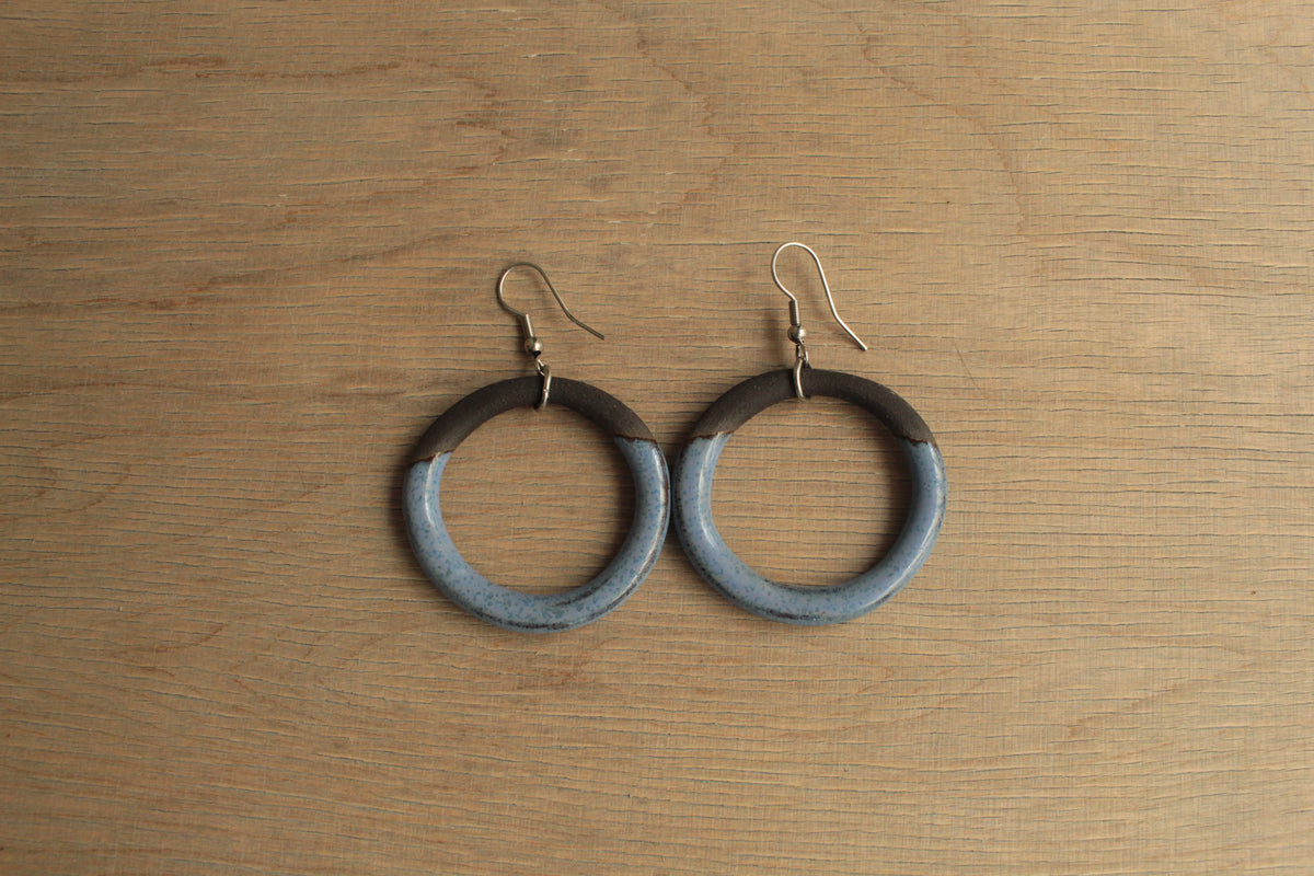 Black and blue hoop dangling earrings