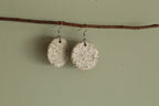 White circle with rocks dangling earrings