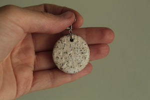 White circle with rocks dangling earrings