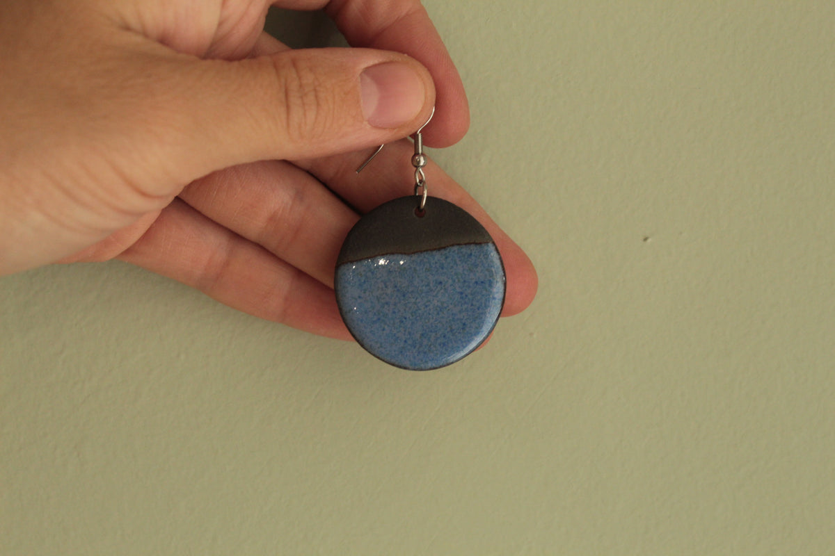 Black and blue circle dangling earrings