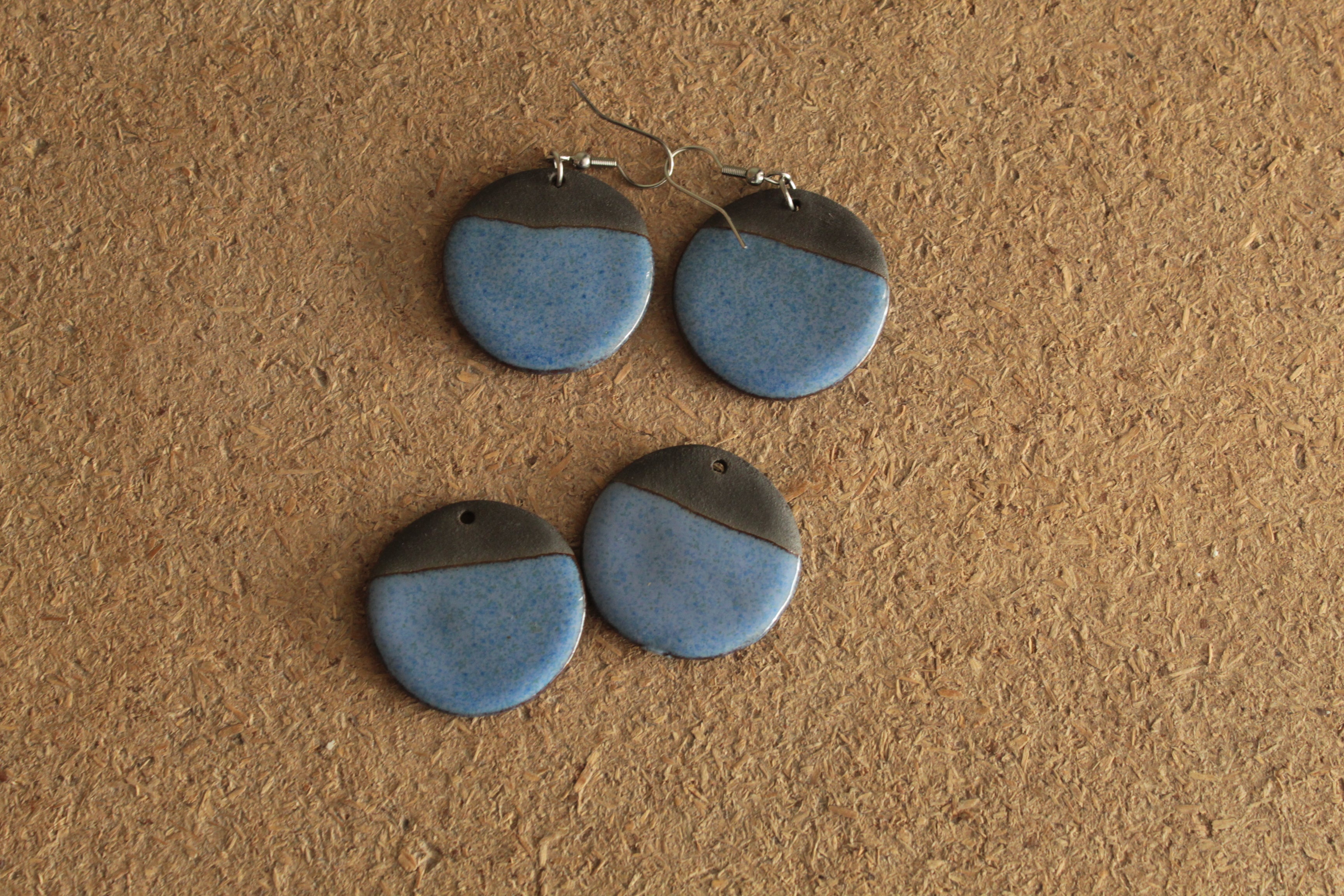 Black and blue circle dangling earrings