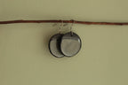 Black and dark sage circle dangling earrings