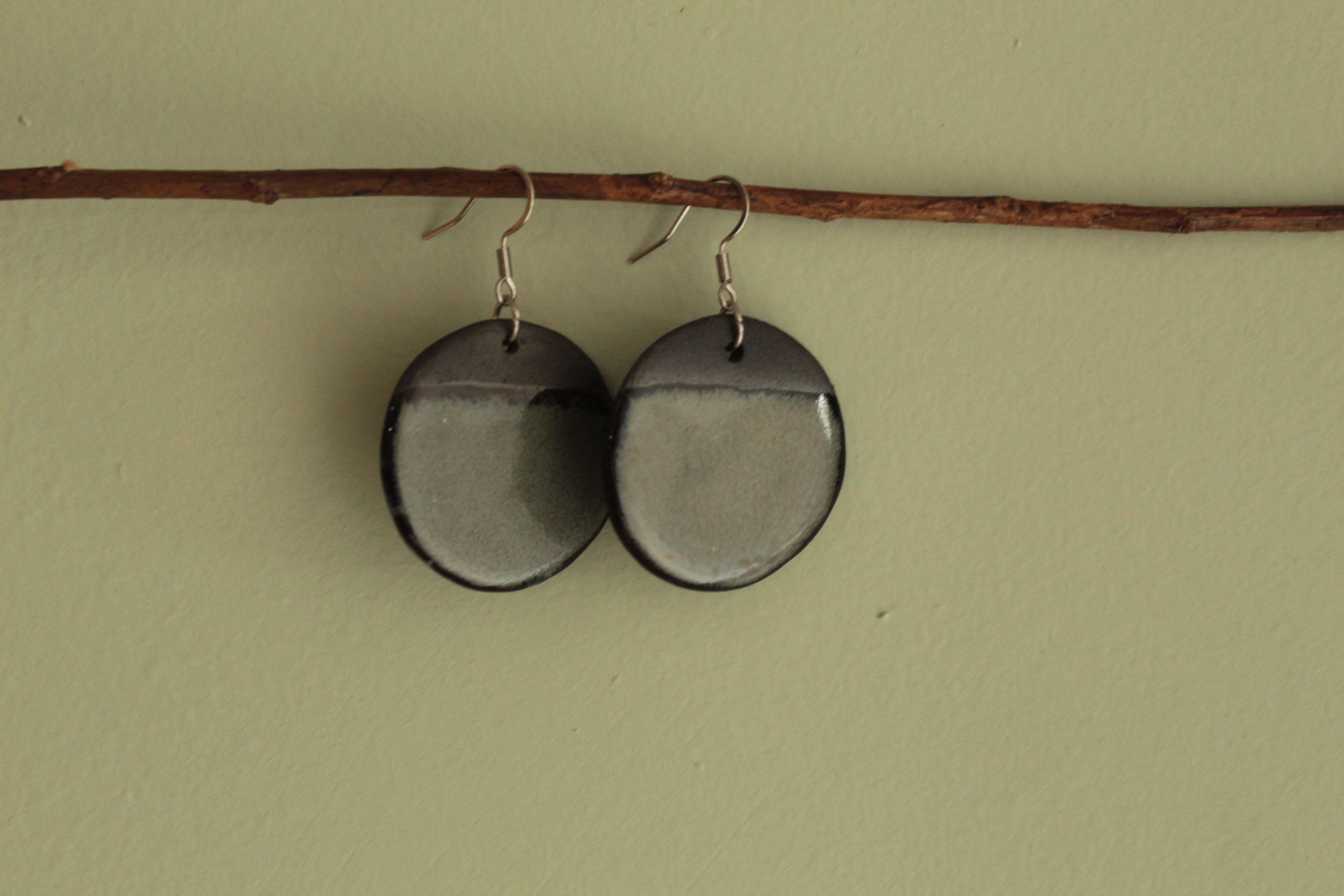 Black and dark ciel circle dangling earrings