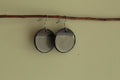 Black and dark sage circle dangling earrings