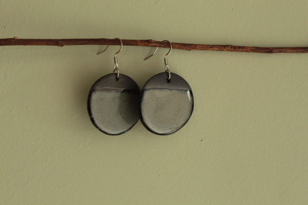Black and dark sage circle dangling earrings