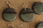 Black and dark sage circle dangling earrings