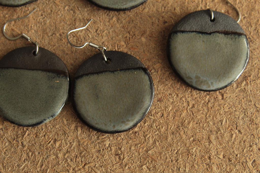 Black and dark sage circle dangling earrings