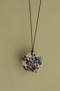 White with dark blue design circle necklace