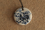Load image into Gallery viewer, White with dark blue design circle necklace
