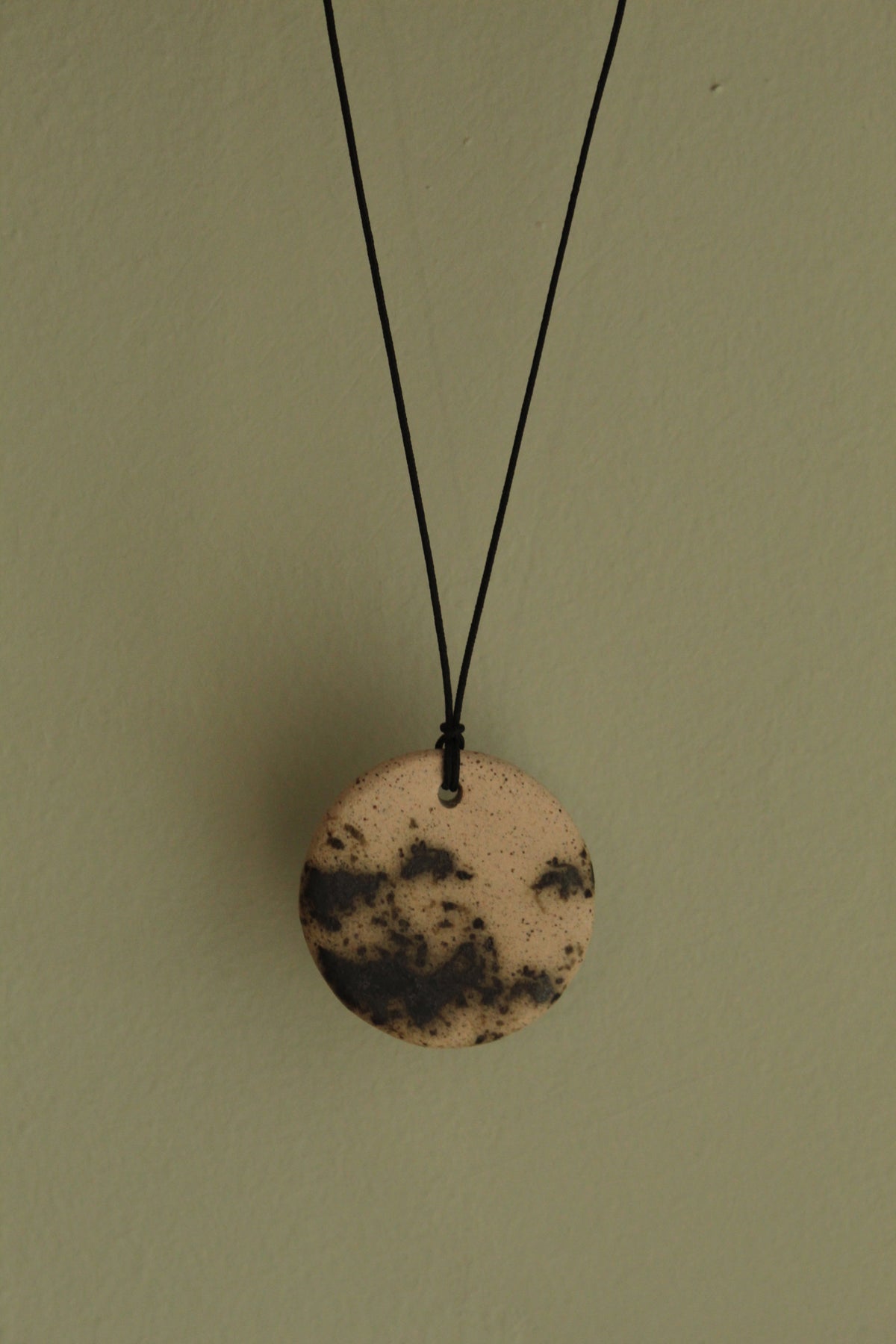 Beige with dark green design circle necklace