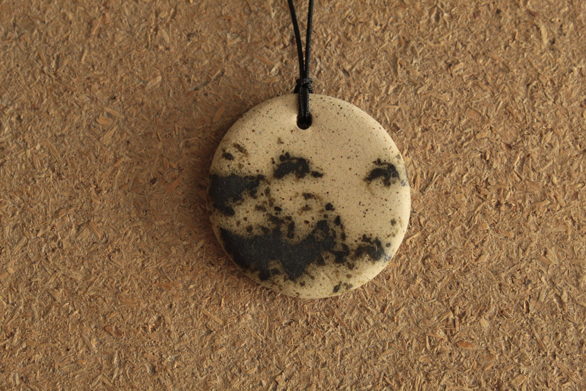 Beige with dark green design circle necklace