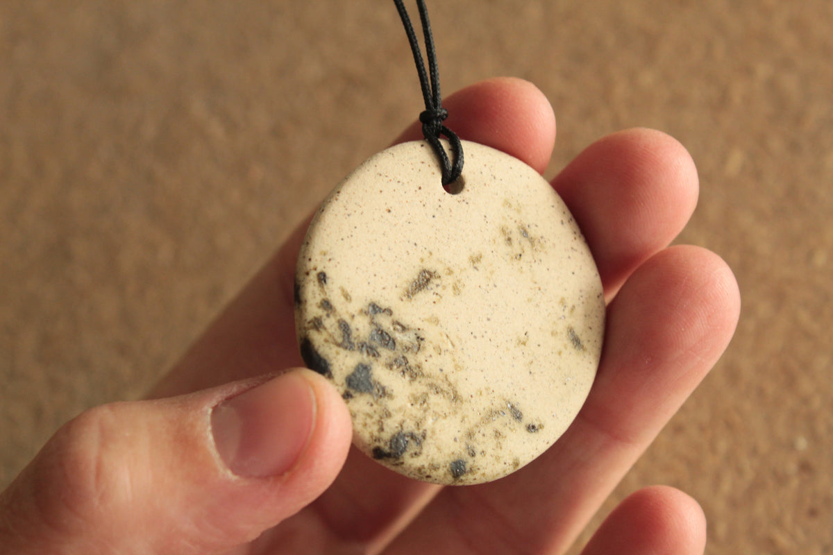 Beige with dark green design circle necklace