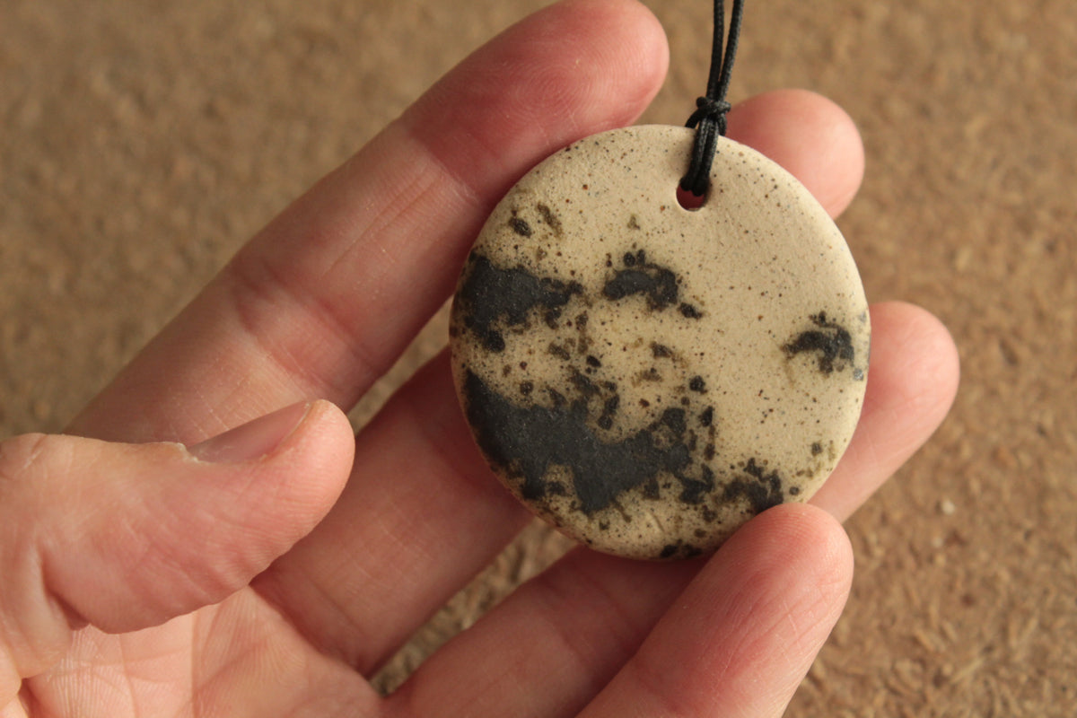 Beige with dark green design circle necklace