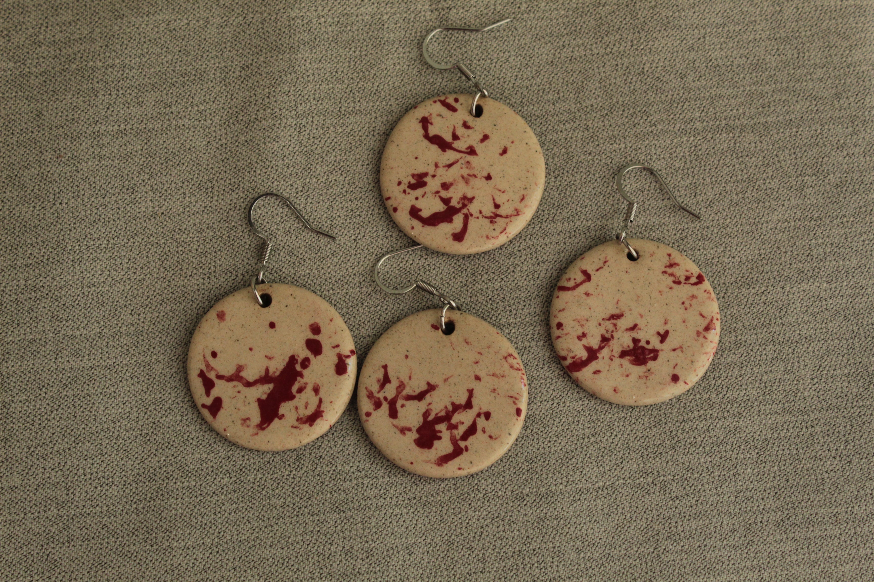 Beige with red design circle dangling earrings
