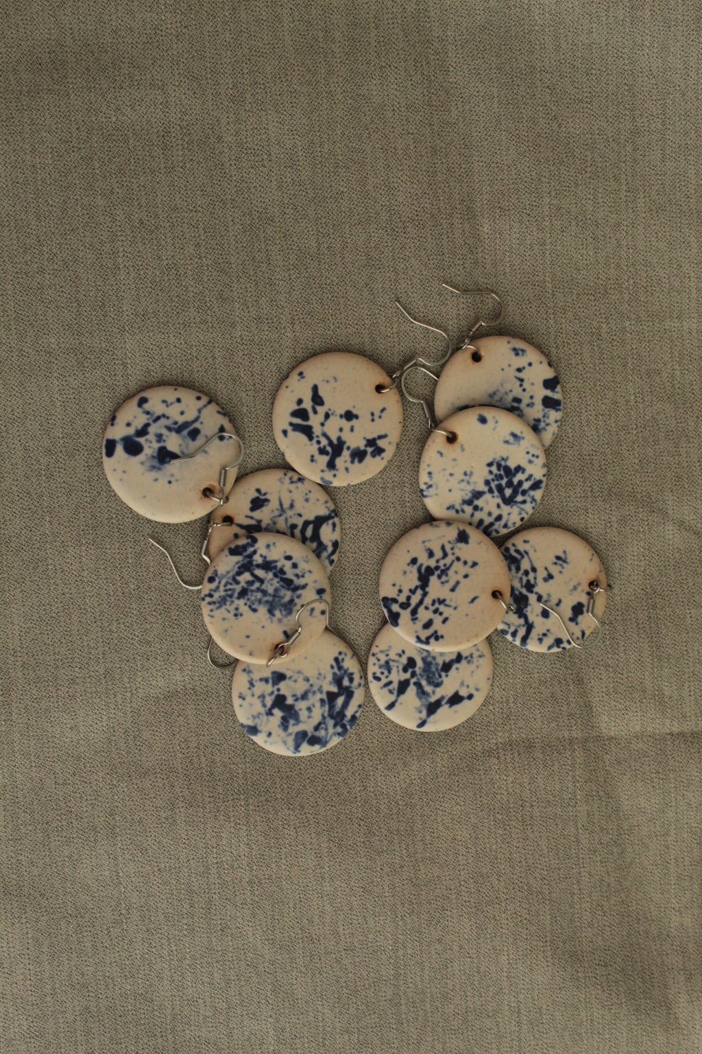 White with blue design circle dangling earrings