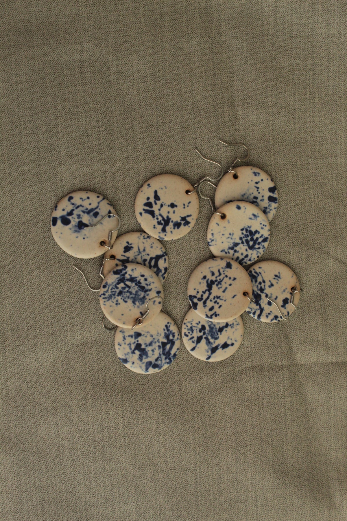 White with blue design circle dangling earrings