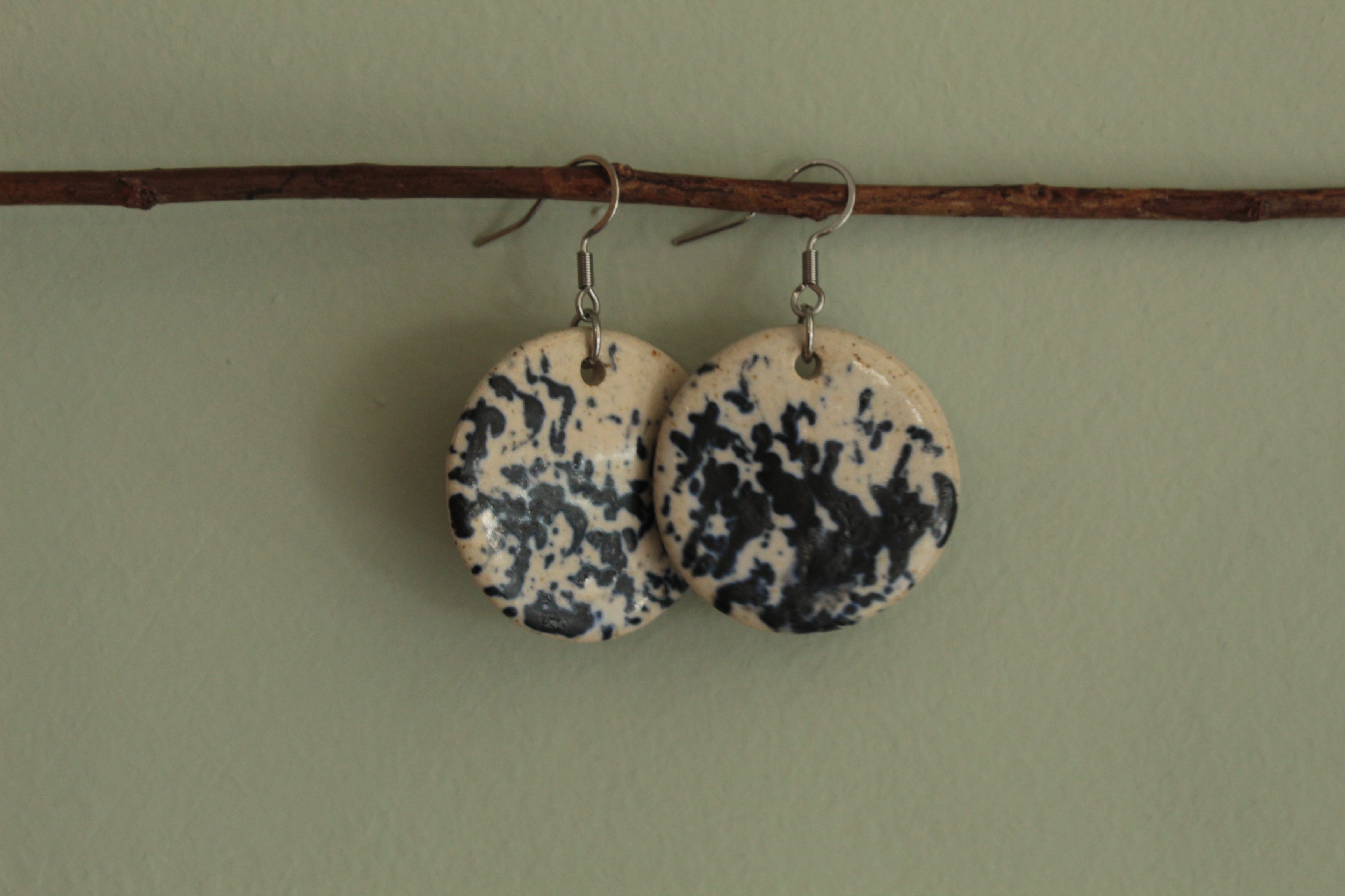 Beige with dark blue design circle dangling earrings