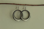 Load image into Gallery viewer, Black and beige hoop dangling earrings
