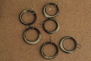 Black and beige hoop dangling earrings