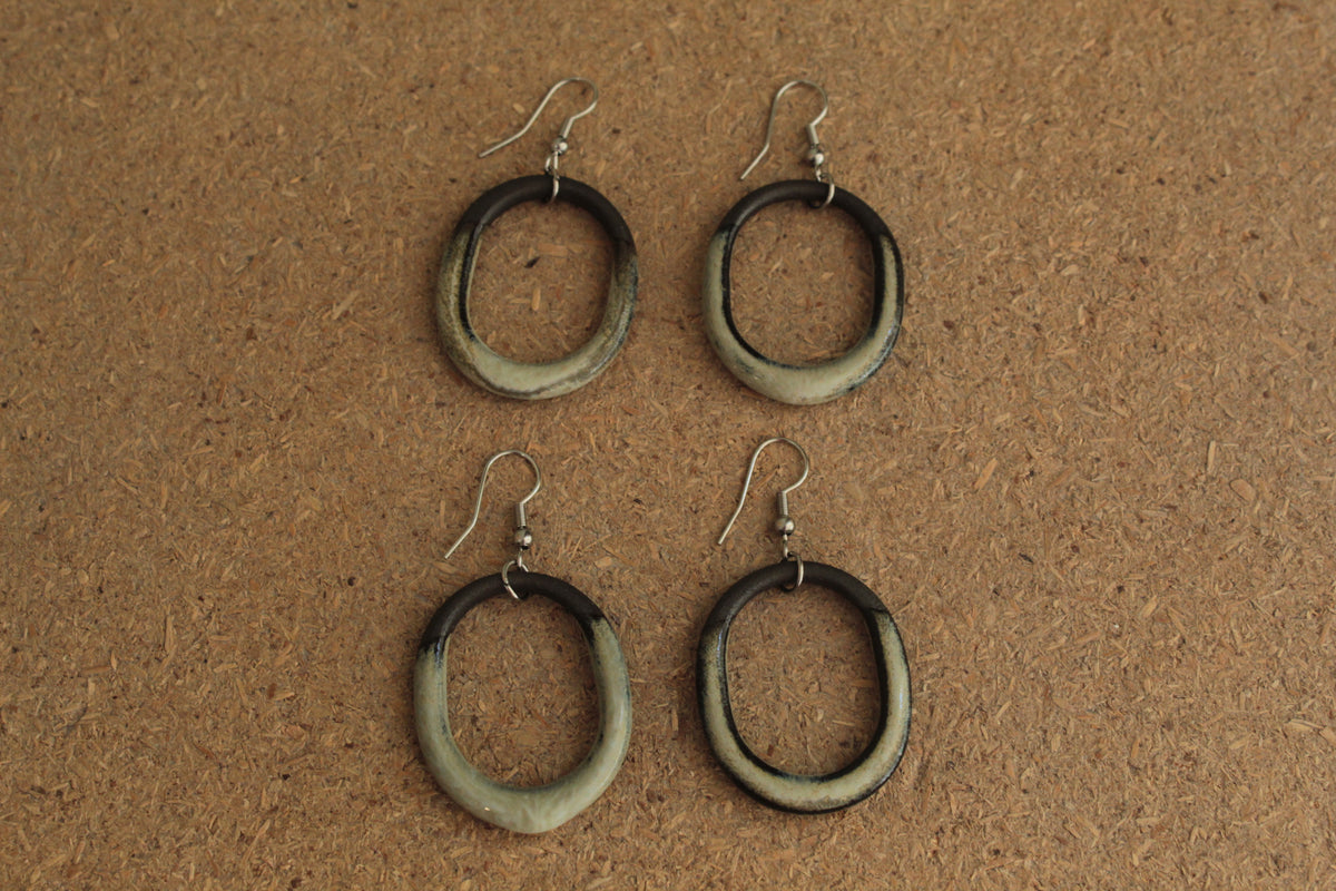 Maira oval hoop dangling earrings