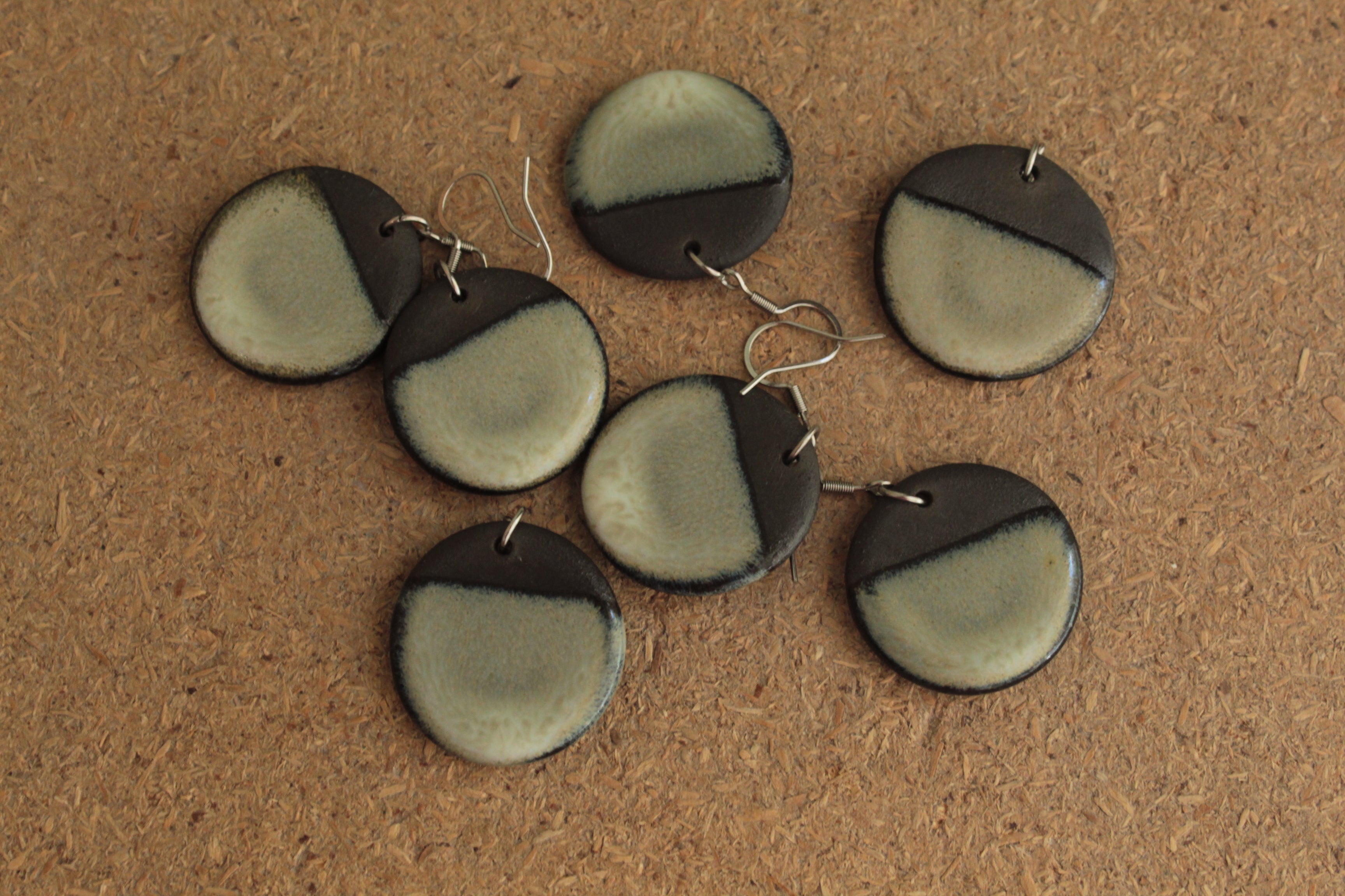 Black and beige circle dangling earrings
