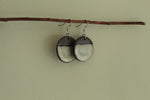 Load image into Gallery viewer, Black and beige circle dangling earrings
