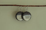 Load image into Gallery viewer, Black and beige circle dangling earrings
