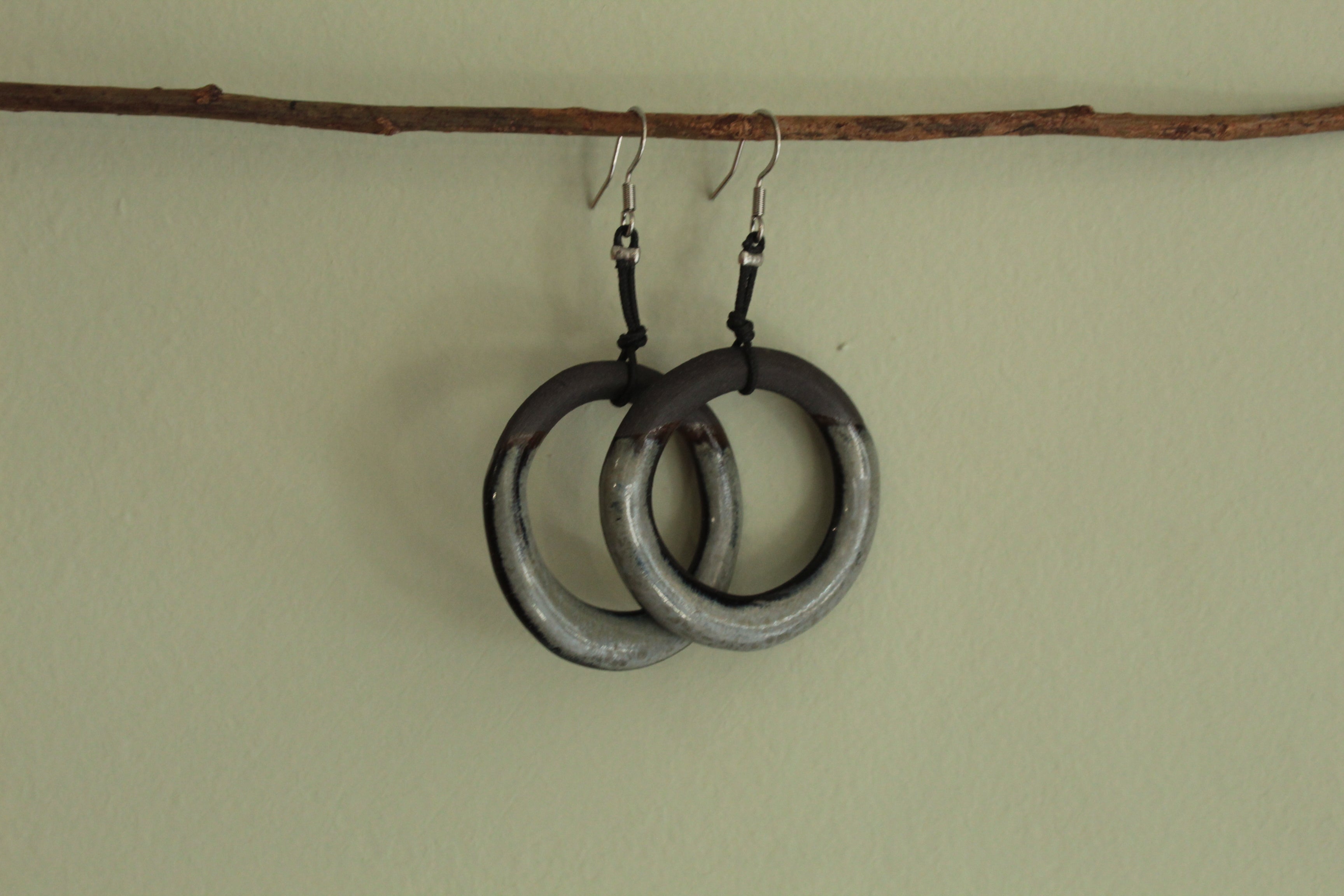 Black and dark ciel hoop dangling earrings with cord