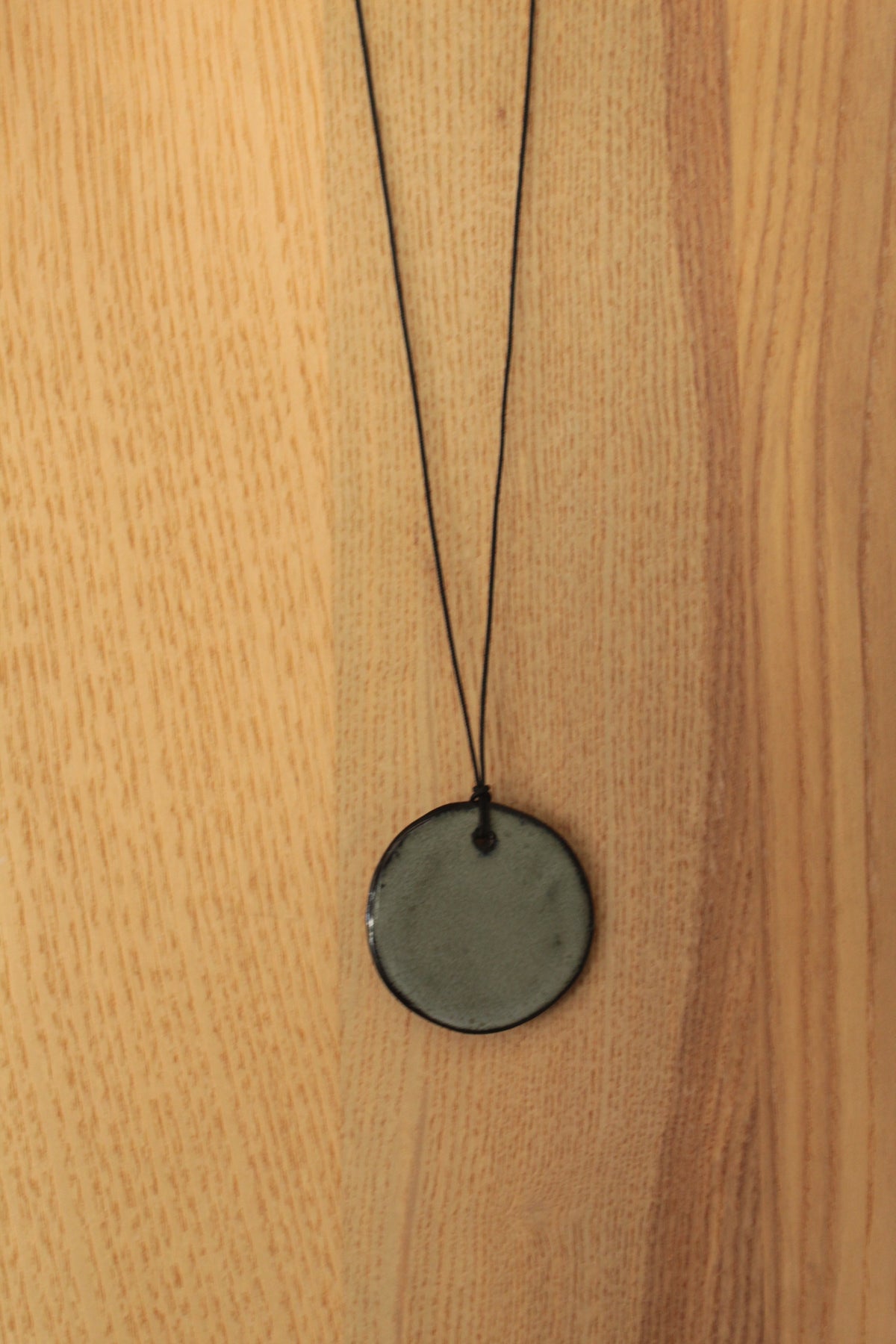 Dark sage green circle necklace