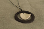 Load image into Gallery viewer, Black hoop and white circle necklace
